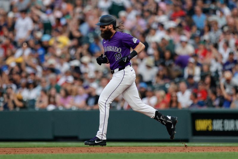 Jul 22, 2024; Denver, Colorado, USA; Colorado Rockies designated hitter Charlie Blackmon (19) rounds the bases on a two run home run in the third inning against the Boston Red Sox at Coors Field. Mandatory Credit: Isaiah J. Downing-USA TODAY Sports