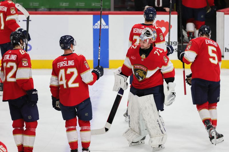 Feb 27, 2024; Sunrise, Florida, USA; Florida Panthers goaltender Sergei Bobrovsky (72) celebrates with teammates after winning the game against the Buffalo Sabres at Amerant Bank Arena. Mandatory Credit: Sam Navarro-USA TODAY Sports