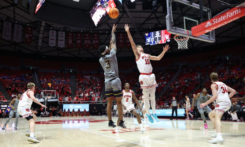 Mar 4, 2025; Salt Lake City, Utah, USA; West Virginia Mountaineers guard KJ Tenner (3) takes a shot over Utah Utes forward Jake Wahlin (10) during the first half at Jon M. Huntsman Center. Mandatory Credit: Rob Gray-Imagn Images