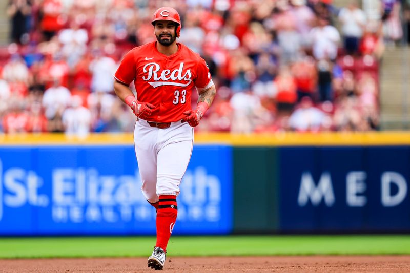 Jun 7, 2025; Cincinnati, Ohio, USA; Cincinnati Reds third baseman Christian Encarnacion-Strand (33) runs the bases after hitting a three-run home run in the first inning at Great American Ball Park. Mandatory Credit: Katie Stratman-Imagn Images