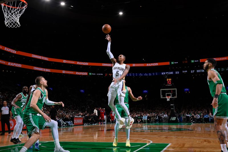 BOSTON, MA - JANUARY 12: Dejounte Murray #5 of the New Orleans Pelicans drives to the basket during the game against the Boston Celtics on January 12, 2025 at TD Garden in Boston, Massachusetts. NOTE TO USER: User expressly acknowledges and agrees that, by downloading and/or using this Photograph, user is consenting to the terms and conditions of the Getty Images License Agreement. Mandatory Copyright Notice: Copyright 2025 NBAE (Photo by Brian Babineau/NBAE via Getty Images)