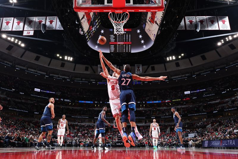 CHICAGO, IL - MARCH 17: Nikola Vucevic #9 of the Chicago Bulls drives to the basket during the game against the Minnesota Timberwolves on March 17, 2023 at United Center in Chicago, Illinois. NOTE TO USER: User expressly acknowledges and agrees that, by downloading and or using this photograph, User is consenting to the terms and conditions of the Getty Images License Agreement. Mandatory Copyright Notice: Copyright 2023 NBAE (Photo by Jeff Haynes/NBAE via Getty Images)