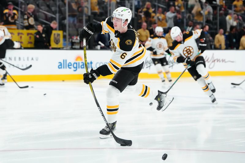 Mar 20, 2025; Las Vegas, Nevada, USA; Boston Bruins defenseman Mason Lohrei (6) warms up before a game against the Vegas Golden Knights at T-Mobile Arena. Mandatory Credit: Stephen R. Sylvanie-Imagn Images