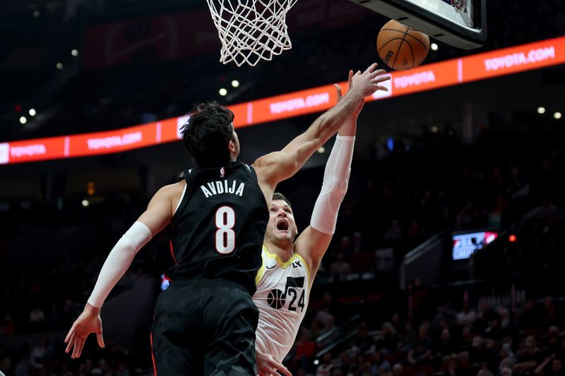 PORTLAND, OREGON - DECEMBER 06: Deni Avdija #8 of the Portland Trail Blazers blocks the shot of Walker Kessler #24 of the Utah Jazz during the first half at Moda Center on December 06, 2024 in Portland, Oregon. NOTE TO USER: User expressly acknowledges and agrees that, by downloading and or using this photograph, User is consenting to the terms and conditions of the Getty Images License Agreement. (Photo by Steph Chambers/Getty Images)