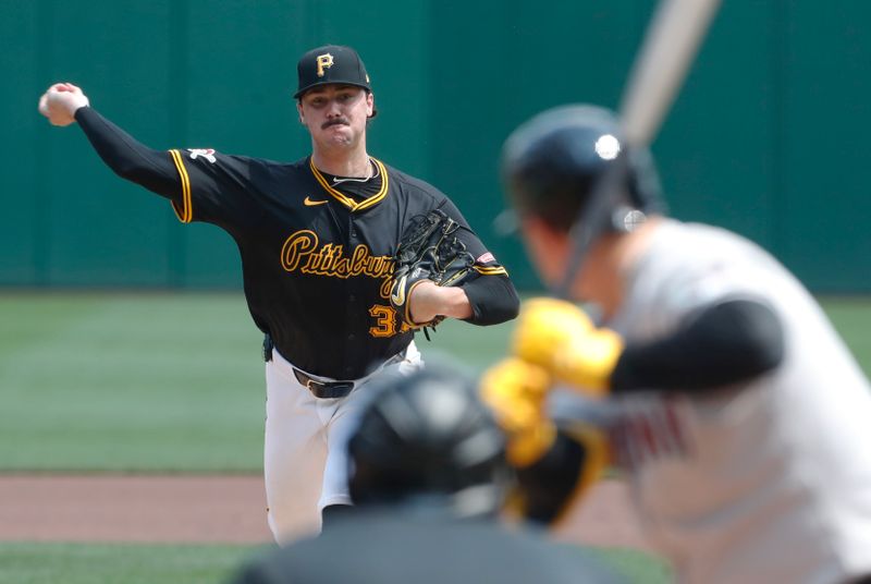 Aug 4, 2024; Pittsburgh, Pennsylvania, USA;  Pittsburgh Pirates starting pitcher Paul Skenes (30) pitches against Arizona Diamondbacks designated hitter Joc Pederson (3) during the fourth inning at PNC Park. Mandatory Credit: Charles LeClaire-USA TODAY Sports