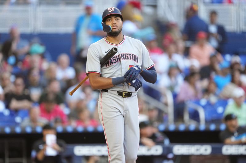 Apr 12, 2025; Miami, Florida, USA;  Washington Nationals left fielder James Wood (29) walks to first base in the seventh inning against the Miami Marlins at loanDepot Park. Mandatory Credit: Jim Rassol-Imagn Images