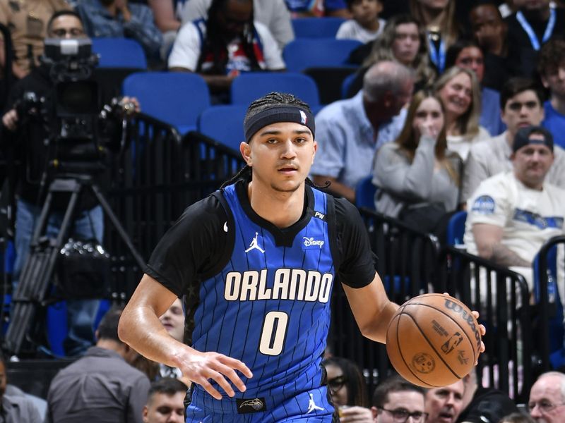 ORLANDO, FL - FEBRUARY 23:  Anthony Black #0 of the Orlando Magic handles the ball during the game against the Washington Wizards on February 23, 2025 at Kia Center in Orlando, Florida. NOTE TO USER: User expressly acknowledges and agrees that, by downloading and or using this photograph, User is consenting to the terms and conditions of the Getty Images License Agreement. Mandatory Copyright Notice: Copyright 2025 NBAE (Photo by Fernando Medina/NBAE via Getty Images)