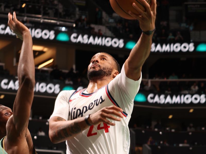 CHARLOTTE, NC - JANUARY 31:  Norman Powell #24 of the LA Clippers shoots the ball during the game against the Charlotte Hornets on January 31, 2025 at Spectrum Center in Charlotte, North Carolina. NOTE TO USER: User expressly acknowledges and agrees that, by downloading and or using this photograph, User is consenting to the terms and conditions of the Getty Images License Agreement. Mandatory Copyright Notice: Copyright 2025 NBAE (Photo by Kent Smith/NBAE via Getty Images)