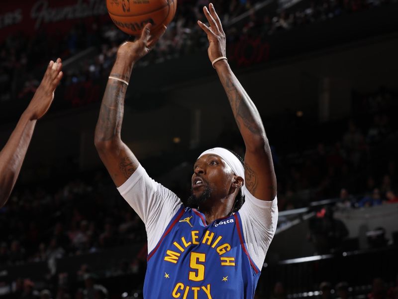 PORTLAND, OR - MARCH 23: Kentavious Caldwell-Pope #5 of the Denver Nuggets shoots the ball during the game against the Portland Trail Blazers on March 23, 2024 at the Moda Center Arena in Portland, Oregon. NOTE TO USER: User expressly acknowledges and agrees that, by downloading and or using this photograph, user is consenting to the terms and conditions of the Getty Images License Agreement. Mandatory Copyright Notice: Copyright 2024 NBAE (Photo by Cameron Browne/NBAE via Getty Images)