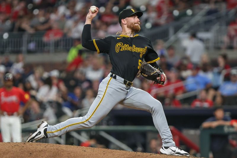 Sep 26, 2025; Cumberland, Georgia, USA; Pittsburgh Pirates pitcher Mike Burrows (53) pitches against the Atlanta Braves during the sixth inning at Truist Park. Mandatory Credit: Jordan Godfree-Imagn Images