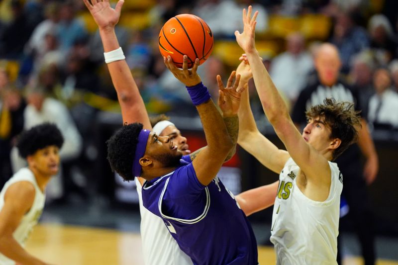 Feb 1, 2026; Boulder, Colorado, USA; Texas Christian University Horned Frogs forward Micah Robinson (5) shoots the ball in the first half against the Colorado Buffaloes at the CU Events Center. Mandatory Credit: Ron Chenoy-Imagn Images