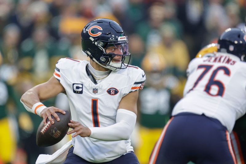 Chicago Bears quarterback Justin Fields (1) passes during an NFL football game between the Green Bay Packers and Chicago Bears Sunday, Jan. 7, 2024, in Green Bay, Wis. (AP Photo/Matt Ludtke)