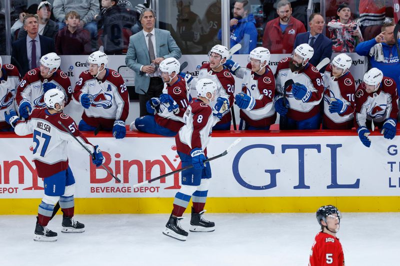 Nov 23, 2025; Chicago, Illinois, USA; Colorado Avalanche defenseman Cale Makar (8) celebrates with teammates after scoring against the Chicago Blackhawks during the second period at United Center. Mandatory Credit: Kamil Krzaczynski-Imagn Images