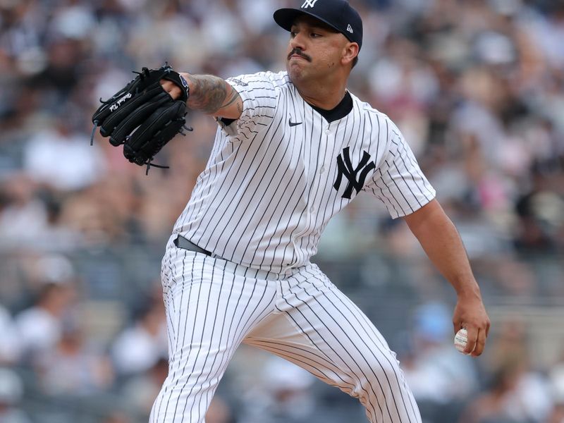 Jul 20, 2024; Bronx, New York, USA; New York Yankees starting pitcher Nestor Cortes (65) pitches against the Tampa Bay Rays during the second inning at Yankee Stadium. Mandatory Credit: Brad Penner-USA TODAY Sports