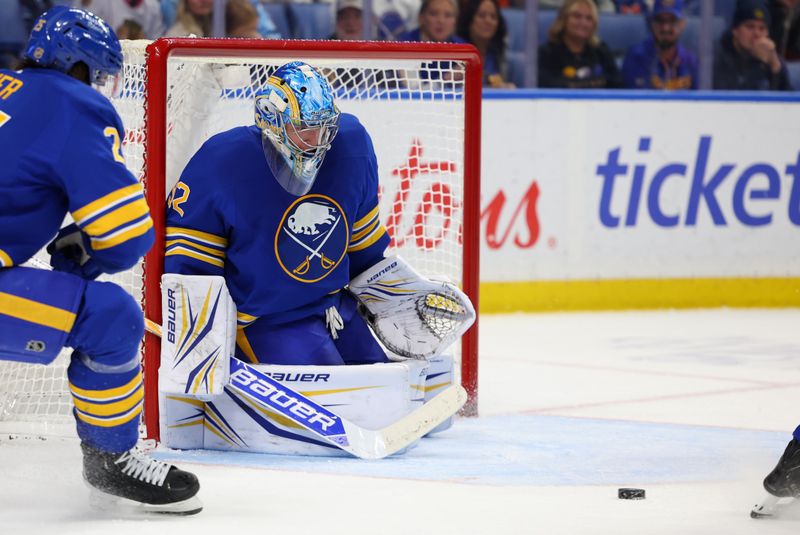 Nov 17, 2025; Buffalo, New York, USA;  Buffalo Sabres goaltender Colten Ellis (92) looks to make a save during the third period against the Edmonton Oilers at KeyBank Center. Mandatory Credit: Timothy T. Ludwig-Imagn Images