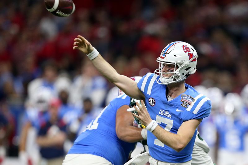 Jan 1, 2022; New Orleans, LA, USA; Mississippi Rebels quarterback Luke Altmyer (7) throws a pass against the Baylor Bears in the second quarter of the 2022 Sugar Bowl at the Caesars Superdome. Mandatory Credit: Chuck Cook-USA TODAY Sports