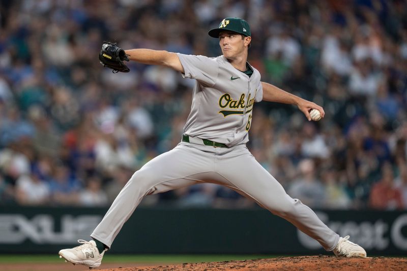 May 10, 2024; Seattle, Washington, USA; Oakland Athletics reliever Easton Lucas (67) delivers a pitch during the sixth inning against the Seattle Mariners at T-Mobile Park. Mandatory Credit: Stephen Brashear-USA TODAY Sports