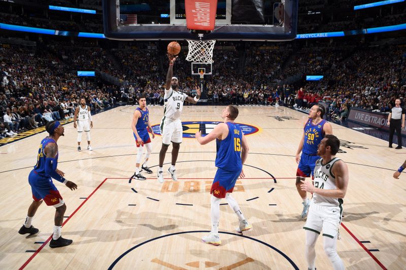 DENVER, CO - MARCH 25: Bobby Portis #9 of the Milwaukee Bucks shoots the ball during the game against the Denver Nuggets on March 25, 2023 at the Ball Arena in Denver, Colorado. NOTE TO USER: User expressly acknowledges and agrees that, by downloading and/or using this Photograph, user is consenting to the terms and conditions of the Getty Images License Agreement. Mandatory Copyright Notice: Copyright 2023 NBAE (Photo by Garrett Ellwood/NBAE via Getty Images)