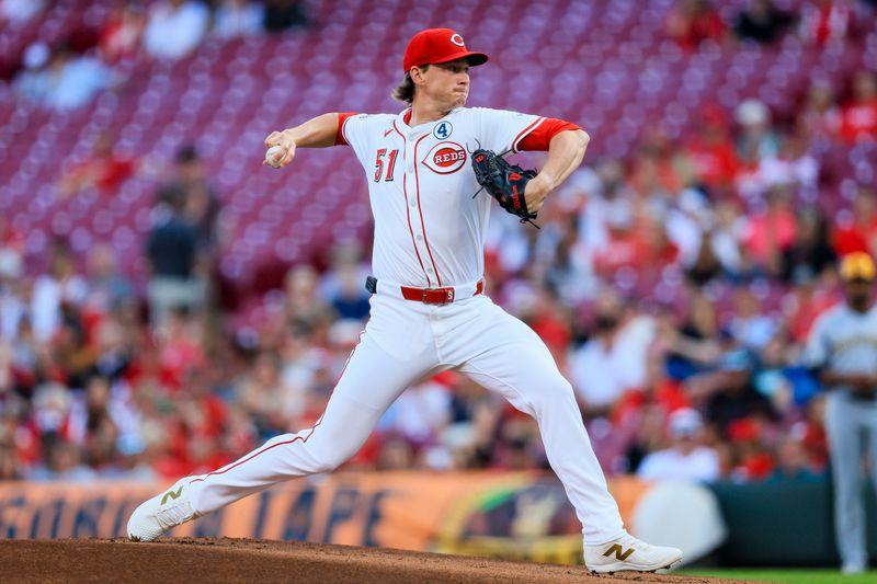 Jun 2, 2025; Cincinnati, Ohio, USA; Cincinnati Reds starting pitcher Brady Singer (51) pitches against the Milwaukee Brewers in the first inning at Great American Ball Park. Mandatory Credit: Katie Stratman-Imagn Images