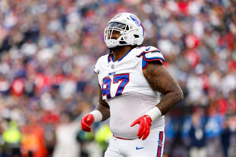 Buffalo Bills defensive tackle Jordan Phillips (97) reacts during the second half of an NFL football game against the New England Patriots on Sunday, Oct. 22, 2023, in Foxborough, Mass. (AP Photo/Greg M. Cooper)