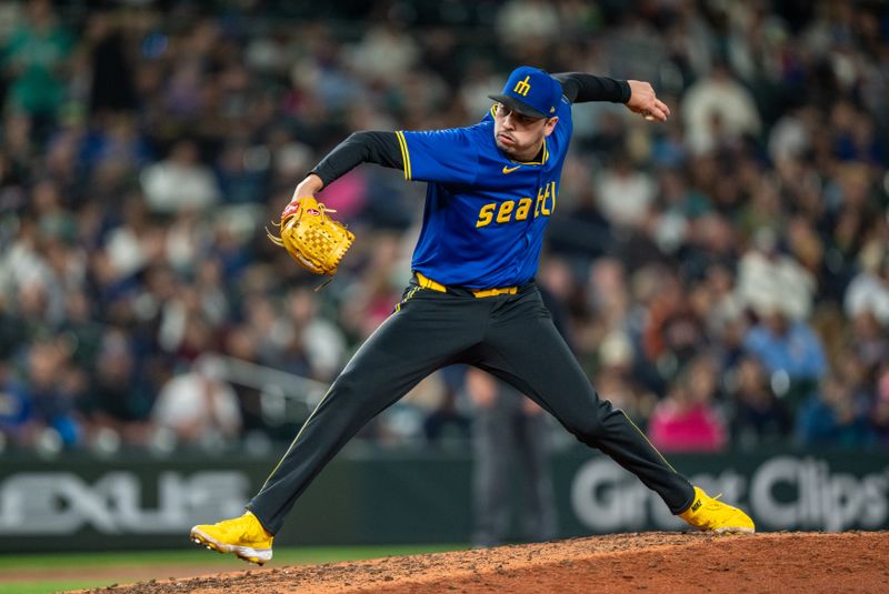 Sep 13, 2024; Seattle, Washington, USA;  Seattle Mariners reliever Tayler Saucedo (60) delivers a pitch during the seventh inning against the Texas Rangers at T-Mobile Park. Mandatory Credit: Stephen Brashear-Imagn Images