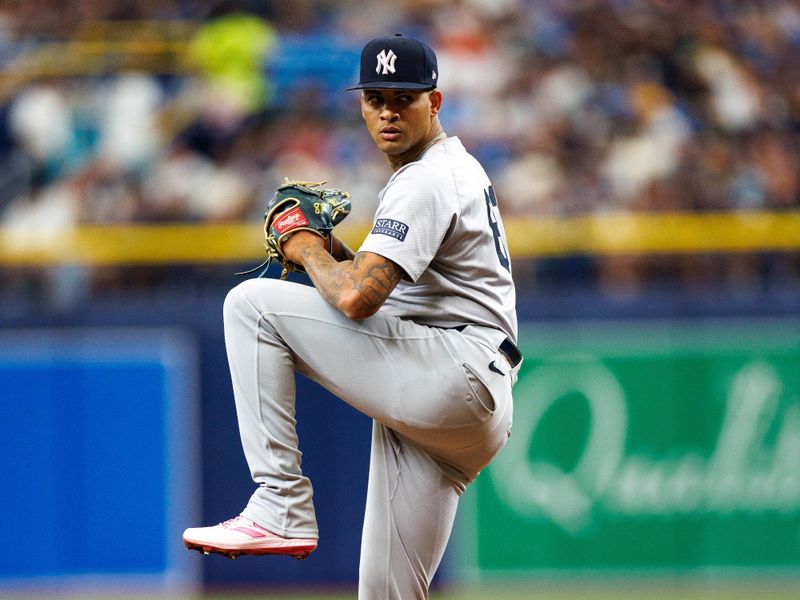 May 12, 2024; St. Petersburg, Florida, USA;  New York Yankees pitcher Luis Gil (81) throws a pitch against the Tampa Bay Rays in the first inning at Tropicana Field. Mandatory Credit: Nathan Ray Seebeck-USA TODAY Sports