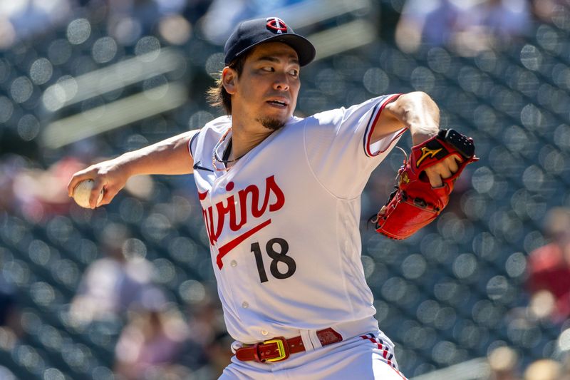 Aug 16, 2023; Minneapolis, Minnesota, USA; Minnesota Twins starting pitcher Kenta Maeda (18) delivers a pitch against the Detroit Tigers in the first inning at Target Field. Mandatory Credit: Jesse Johnson-USA TODAY Sports