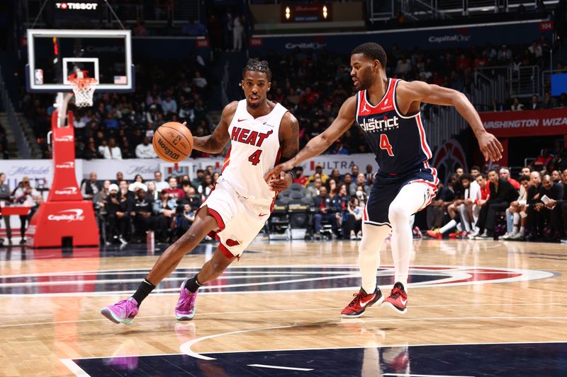 WASHINGTON, DC -? MARCH 31:  Delon Wright #4 of the Miami Heat handles the ball during the game against the Washington Wizards on March 31, 2024 at Capital One Arena in Washington, DC. NOTE TO USER: User expressly acknowledges and agrees that, by downloading and or using this Photograph, user is consenting to the terms and conditions of the Getty Images License Agreement. Mandatory Copyright Notice: Copyright 2024 NBAE (Photo by Kenny Giarla/NBAE via Getty Images)