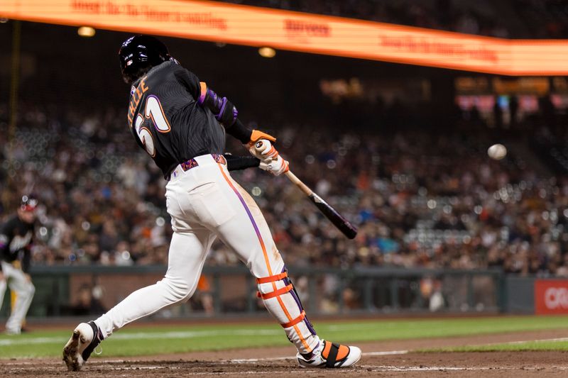 May 13, 2025; San Francisco, California, USA; San Francisco Giants center fielder Jung Hoo Lee (51) hits a three-run home run against the Arizona Diamondbacks during the eighth inning at Oracle Park. Mandatory Credit: John Hefti-Imagn Images