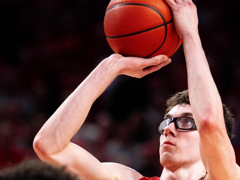 Mar 3, 2024; Lincoln, Nebraska, USA; Rutgers Scarlet Knights guard Gavin Griffiths (10) shoots a free throw against the Nebraska Cornhuskers during the second half at Pinnacle Bank Arena. Mandatory Credit: Dylan Widger-USA TODAY Sports