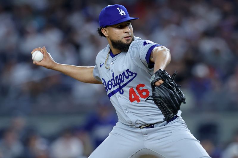 Jun 7, 2024; Bronx, New York, USA; Los Angeles Dodgers relief pitcher Yohan Ramirez (46) pitches against the New York Yankees during the eleventh inning at Yankee Stadium. Mandatory Credit: Brad Penner-USA TODAY Sports