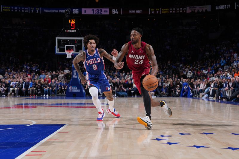 PHILADELPHIA, PA - APRIL 17: Haywood Highsmith #24 of the Miami Heat dribbles the ball during the game against the Philadelphia 76ers during the 2024 NBA Play-In Tournament on April 17, 2024 at the Wells Fargo Center in Philadelphia, Pennsylvania NOTE TO USER: User expressly acknowledges and agrees that, by downloading and/or using this Photograph, user is consenting to the terms and conditions of the Getty Images License Agreement. Mandatory Copyright Notice: Copyright 2024 NBAE (Photo by Jesse D. Garrabrant/NBAE via Getty Images)