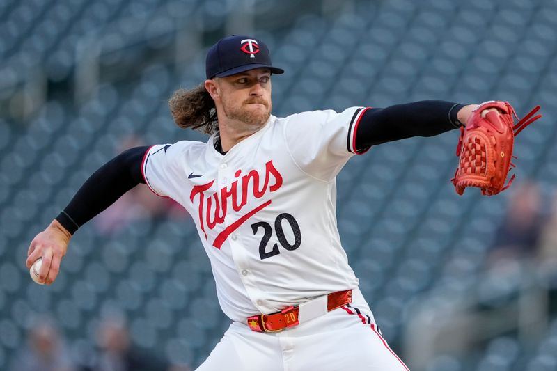 May 8, 2024; Minneapolis, Minnesota, USA; Minnesota Twins starting pitcher Chris Paddack (20) delivers a pitch against the Seattle Mariners in the first inning at Target Field. Mandatory Credit: Jesse Johnson-USA TODAY Sports