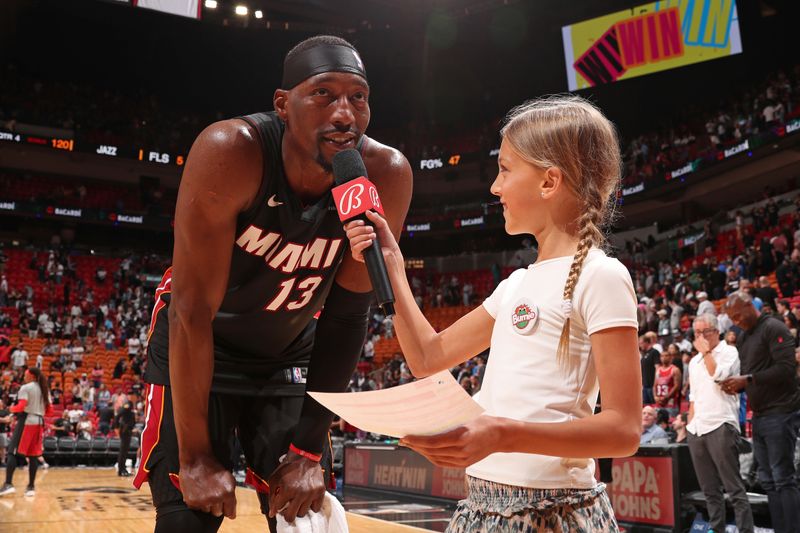 MIAMI, FL - MARCH 2: Bam Adebayo #13 of the Miami Heat talks to the media after the game against the Utah Jazz on March 2, 2024 at Kaseya Center in Miami, Florida. NOTE TO USER: User expressly acknowledges and agrees that, by downloading and or using this Photograph, user is consenting to the terms and conditions of the Getty Images License Agreement. Mandatory Copyright Notice: Copyright 2024 NBAE (Photo by Issac Baldizon/NBAE via Getty Images)