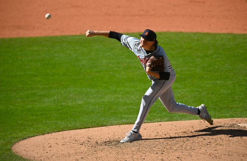 Oct 5, 2024; Cleveland, Ohio, USA; Detroit Tigers pitcher Reese Olson (45) throws in the fifth inning against the Cleveland Guardians in game one of the ALDS for the 2024 MLB Playoffs at Progressive Field. Mandatory Credit: David Richard-Imagn Images