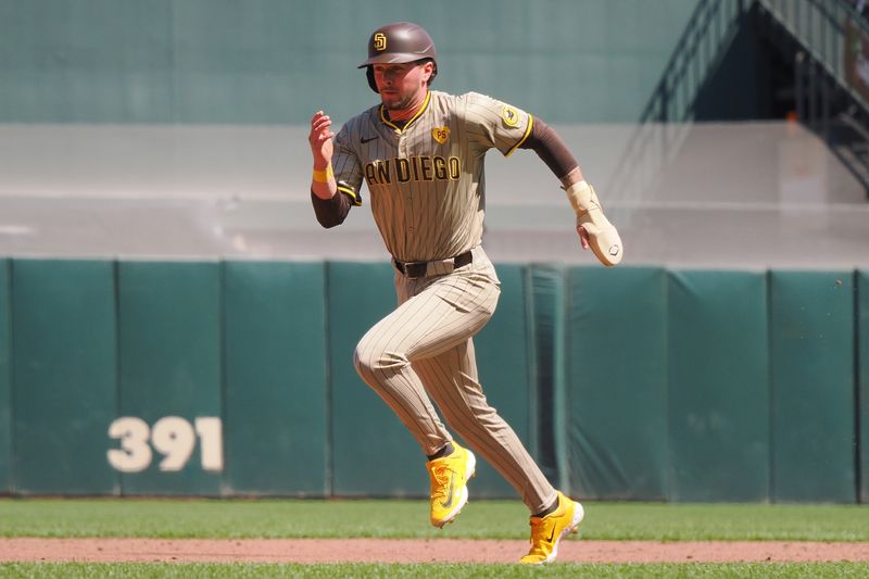 Apr 5, 2024; San Francisco, California, USA; San Diego Padres center fielder Jackson Merrill (3) runs to third base against the San Francisco Giants during the third inning at Oracle Park. Mandatory Credit: Kelley L Cox-USA TODAY Sports