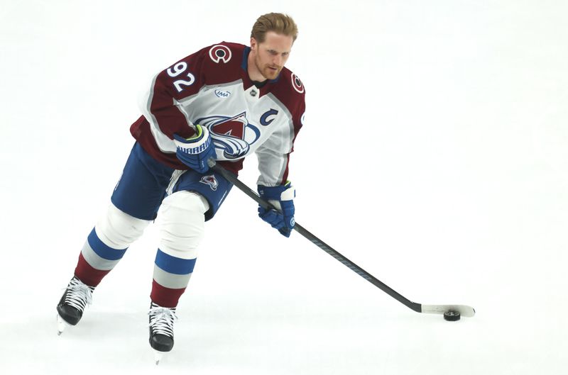 Mar 24, 2026; Pittsburgh, Pennsylvania, USA;  Colorado Avalanche left wing Gabriel Landeskog (92) warms up against the Pittsburgh Penguins at PPG Paints Arena. Mandatory Credit: Charles LeClaire-Imagn Images