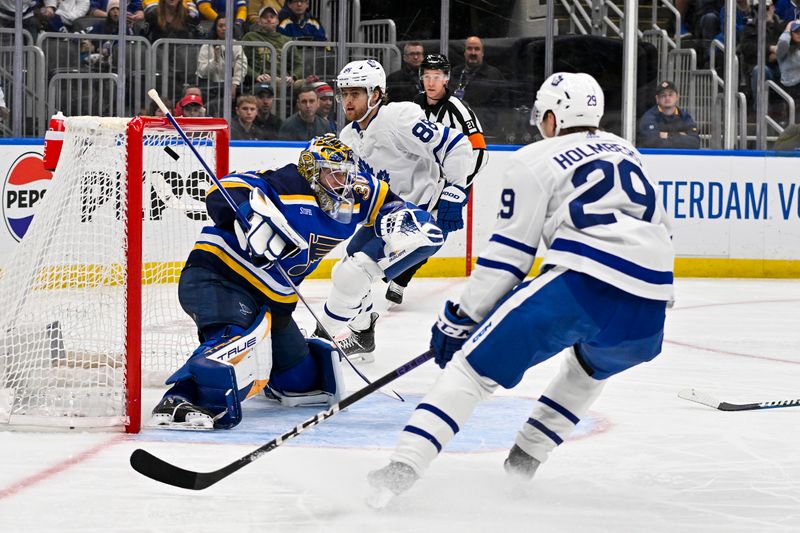 Feb 19, 2024; St. Louis, Missouri, USA;  Toronto Maple Leafs right wing William Nylander (88) shoots and scores against St. Louis Blues goaltender Joel Hofer (30) during the third period at Enterprise Center. Mandatory Credit: Jeff Curry-USA TODAY Sports