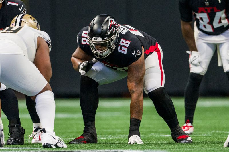 Atlanta Falcons offensive tackle Elijah Wilkinson (68) lines up during the first half of an NFL football game against the New Orleans Saints, Sunday, Sep. 11, 2022, in Atlanta. The New Orleans Saints won 27-26. (AP Photo/Danny Karnik)