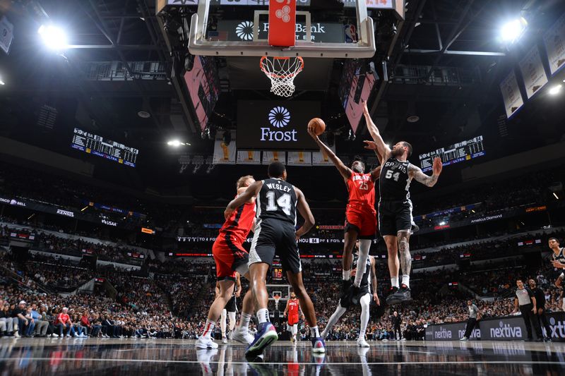 SAN ANTONIO, TX - MARCH 12: Reggie Bullock Jr. #25 of the Houston Rockets drives to the basket during the game against the San Antonio Spurs on March 12, 2024 at the Frost Bank Center in San Antonio, Texas. NOTE TO USER: User expressly acknowledges and agrees that, by downloading and or using this photograph, user is consenting to the terms and conditions of the Getty Images License Agreement. Mandatory Copyright Notice: Copyright 2024 NBAE (Photos by Michael Gonzales/NBAE via Getty Images)