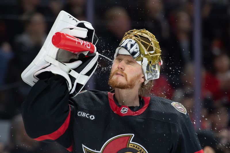 Jan 20, 2024; Ottawa, Ontario, CAN; Ottawa Senators goalie Joonas Korpisalo (70) cools down prior to the start of the second period against the Winnipeg Jets in the second period at the Canadian Tire Centre. Mandatory Credit: Marc DesRosiers-USA TODAY Sports