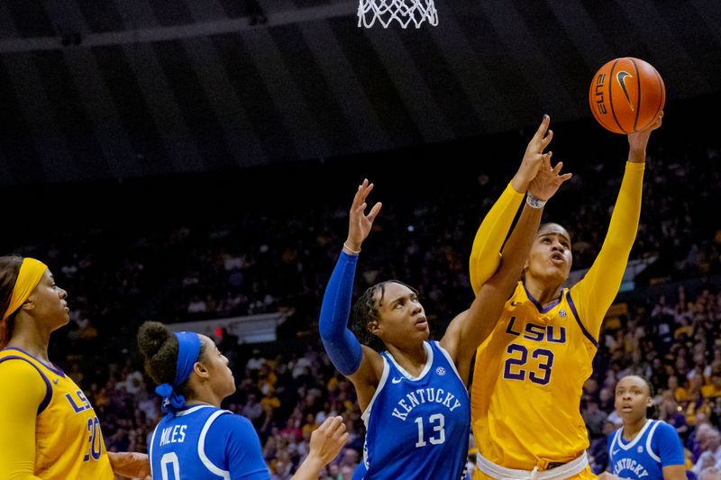 Mar 3, 2024; Baton Rouge, Louisiana, USA; LSU Lady Tigers center Aalyah Del Rosario (23) shoots against Kentucky Wildcats forward Ajae Petty (13) during the second half at Pete Maravich Assembly Center. Mandatory Credit: Matthew Hinton-USA TODAY Sports