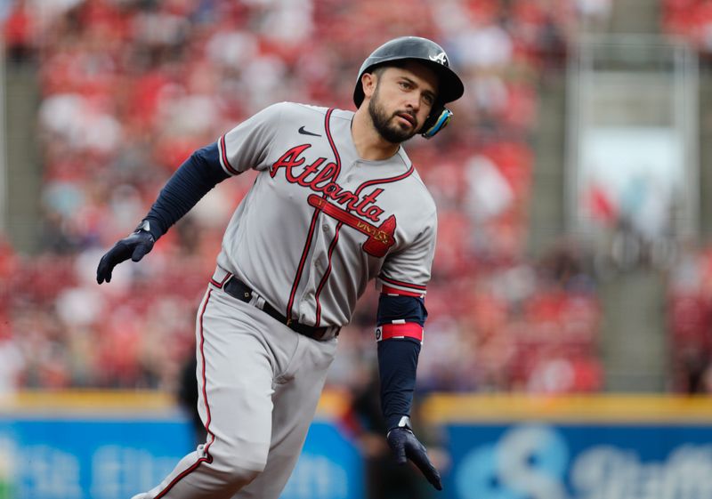 Jun 23, 2023; Cincinnati, Ohio, USA; Atlanta Braves catcher Travis d'Arnaud (16) runs the bases after hitting a three-run home run against the Cincinnati Reds during the first inning at Great American Ball Park. Mandatory Credit: David Kohl-USA TODAY Sports