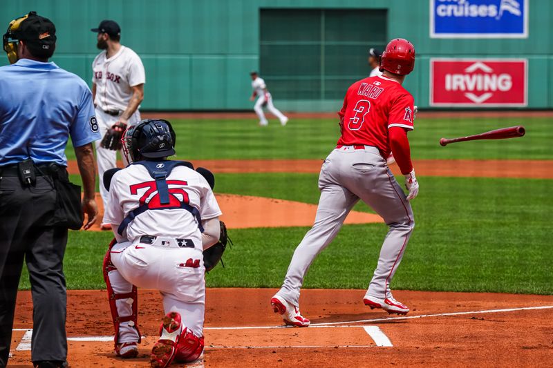 Jun 4, 2025; Boston, Massachusetts, USA; Los Angeles Angels outfielder Taylor Ward (3) his a three run home run against the Boston Red Sox in the first inning at Fenway Park. Mandatory Credit: David Butler II-Imagn Images