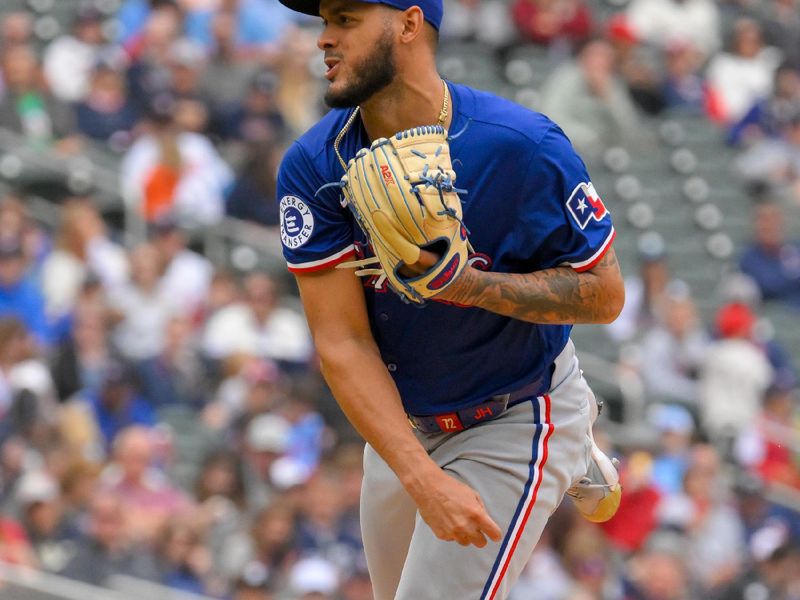 May 26, 2024; Minneapolis, Minnesota, USA;  Texas Rangers pitcher Jonathan Hernandez (72) delivers a pitch against the Minnesota Twins during the sixth inning at Target Field. Mandatory Credit: Nick Wosika-USA TODAY Sports