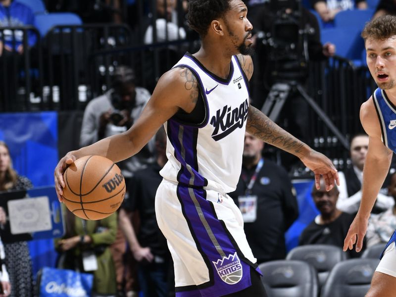 ORLANDO, FL - MARCH 23: Malik Monk #0 of the Sacramento Kings handles the ball during the game against the Orlando Magic on March 23, 2024 at the Kia Center in Orlando, Florida. NOTE TO USER: User expressly acknowledges and agrees that, by downloading and or using this photograph, User is consenting to the terms and conditions of the Getty Images License Agreement. Mandatory Copyright Notice: Copyright 2024 NBAE (Photo by Fernando Medina/NBAE via Getty Images)