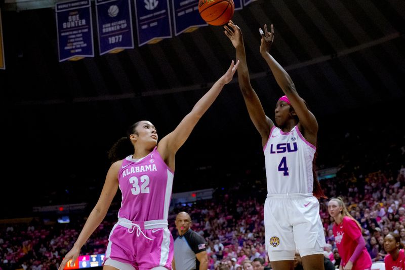 Feb 11, 2024; Baton Rouge, Louisiana, USA; LSU Lady Tigers guard Flau'jae Johnson (4) attempts a three point basket against Alabama Crimson Tide guard Aaliyah Nye (32) during the first half at Pete Maravich Assembly Center. Mandatory Credit: Matthew Hinton-USA TODAY Sports