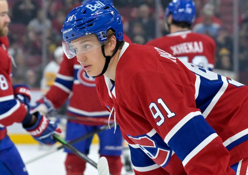 Oct 14, 2024; Montreal, Quebec, CAN; Montreal Canadiens forward Oliver Kapanen (91) stretches during the warmup period before the game against the Pittsburgh Penguins at the Bell Centre. Mandatory Credit: Eric Bolte-Imagn Images