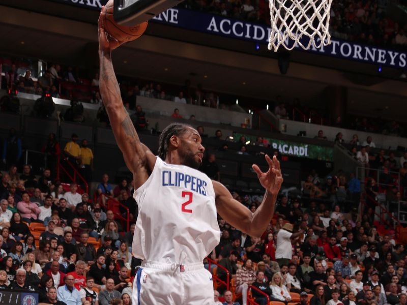 MIAMI, FL - FEBRUARY 4: Kawhi Leonard #2 of the LA Clippers rebounds the ball during the game against the Miami Heat on February 4, 2024 at Kaseya Center in Miami, Florida. NOTE TO USER: User expressly acknowledges and agrees that, by downloading and or using this Photograph, user is consenting to the terms and conditions of the Getty Images License Agreement. Mandatory Copyright Notice: Copyright 2024 NBAE (Photo by Issac Baldizon/NBAE via Getty Images)