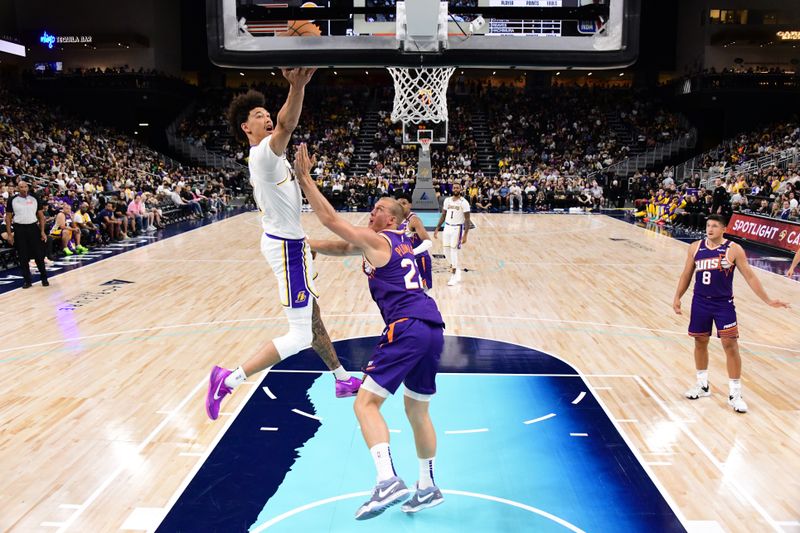 LOS ANGELES, CA - OCTOBER 6: Jaxson Hayes #11 of the Los Angeles Lakers drives to the basket during the game against the Phoenix Suns on October 6, 2024 at Acrisure Arena in Palm Springs, California. NOTE TO USER: User expressly acknowledges and agrees that, by downloading and/or using this Photograph, user is consenting to the terms and conditions of the Getty Images License Agreement. Mandatory Copyright Notice: Copyright 2024 NBAE (Photo by Adam Pantozzi/NBAE via Getty Images)